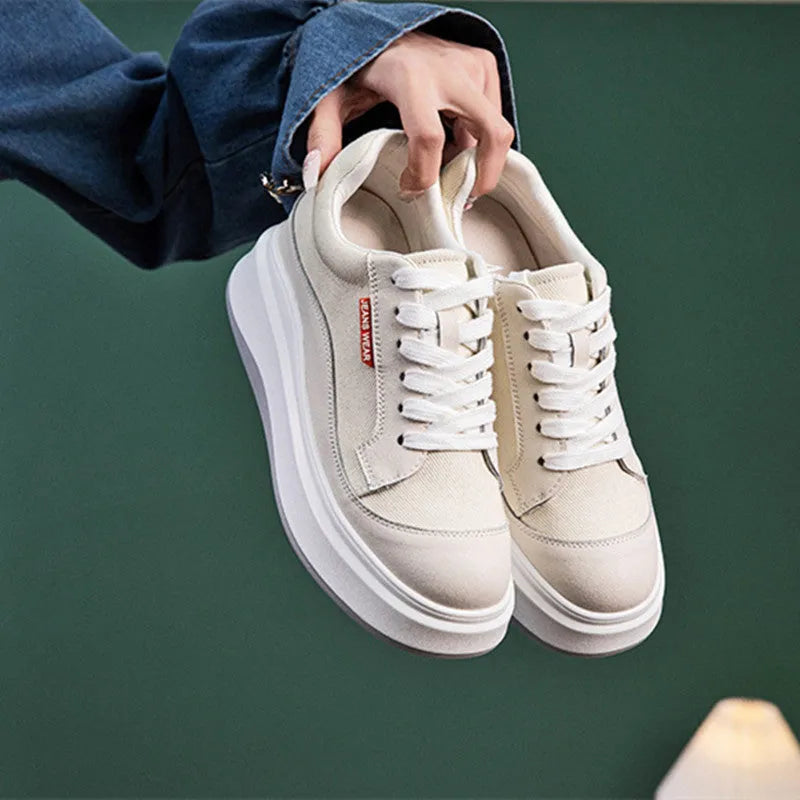 Women's beige leather board shoes with thick sole for height increase, showing cowhide leather upper and casual design