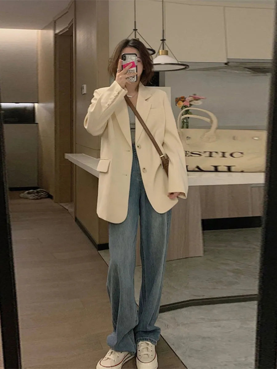 Korean-style solid colour suit jacket with long sleeves and practical pockets