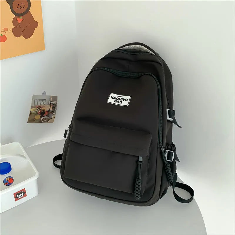 Korean-style lightweight waterproof nylon school backpack 20-35L macaron colour curved shoulder strap