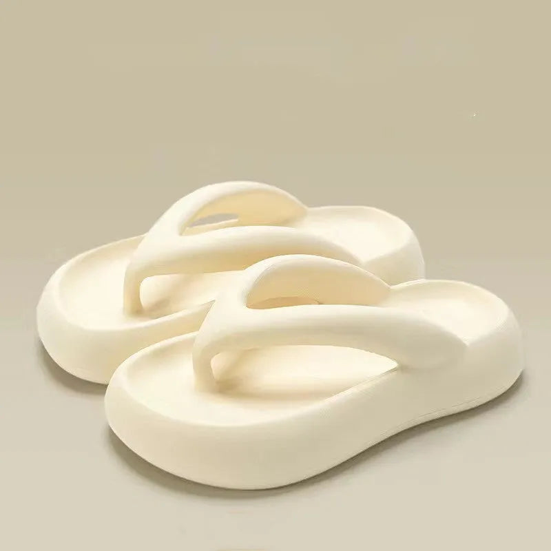 Solid colour thick-soled EVA flip-flops with decorative bow on strap.