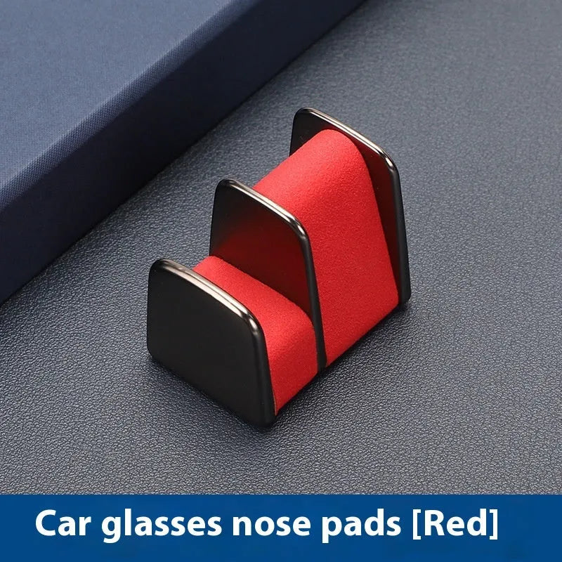 Zinc alloy and leather car dashboard sunglasses clip holder in green, black, grey, or red.