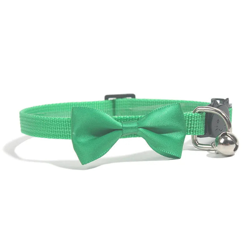 Adjustable striped nylon cat collar with a small bell, shown in multiple colour options on a white background.