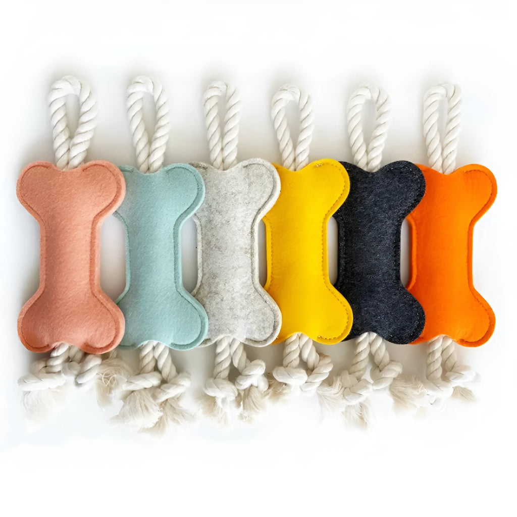Bone shaped dog toy with rope knot design in choice of four colours for bite resistant training