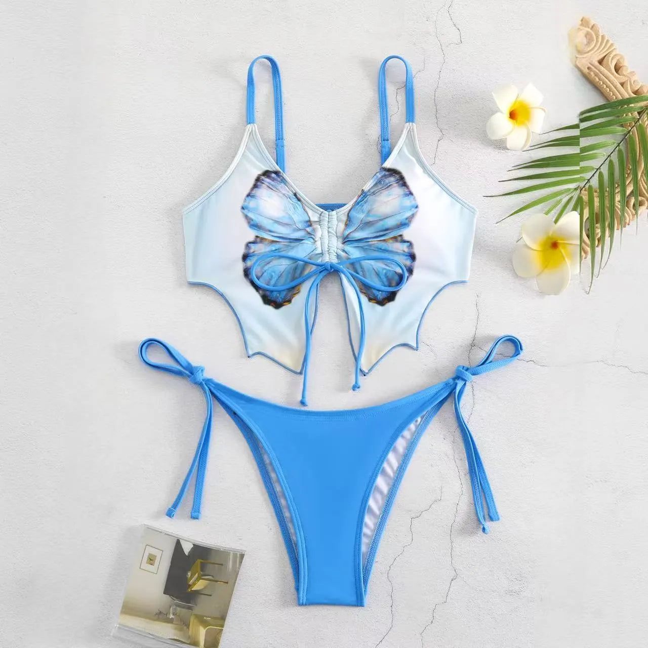 Women's purple bow ins style split bikini set with sleeveless top and briefs for swimming.