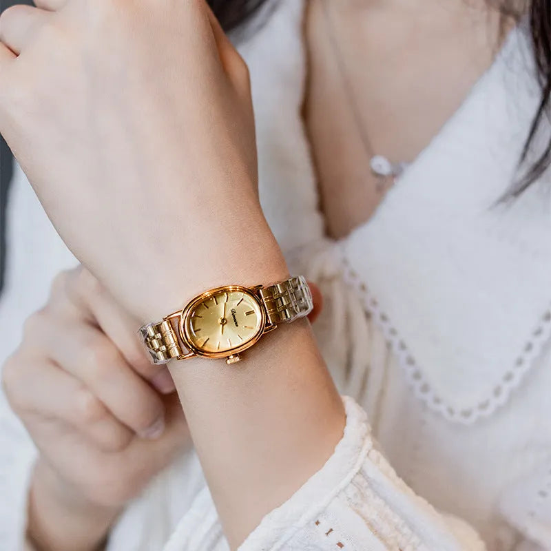 Oval mid-ancient steel watch for women with gold surface and red noodles, 7mm thin antique style dial