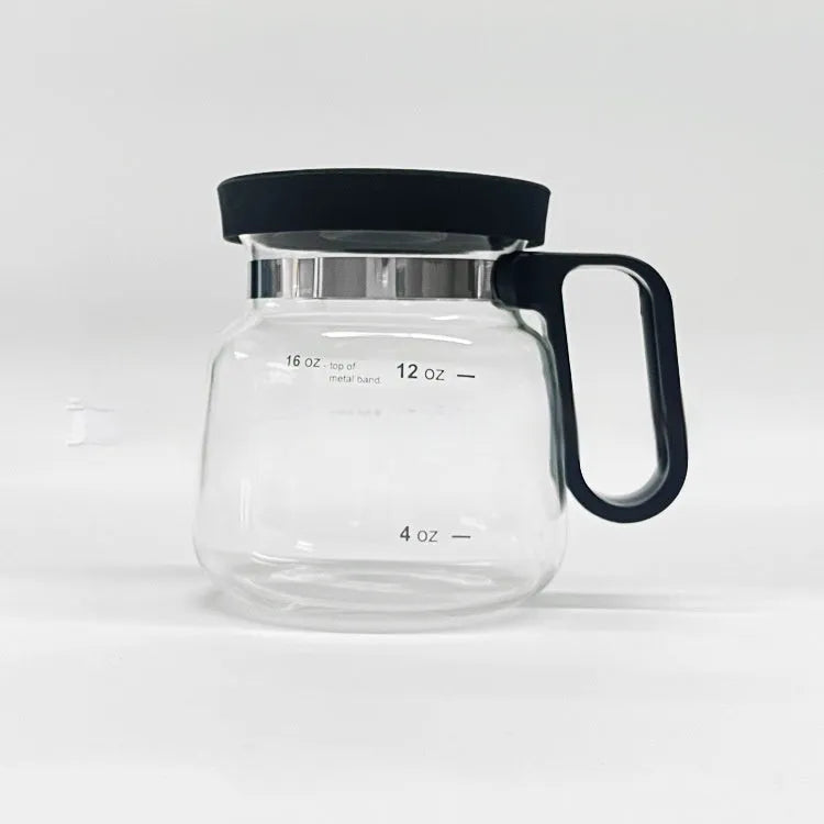 Transparent borosilicate glass stovetop coffee maker with a black silicone cover