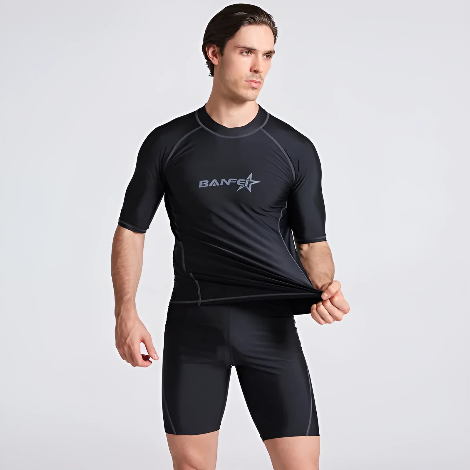 Men's navy blue quick-dry nylon swimsuit set with half sleeves and long swim pants