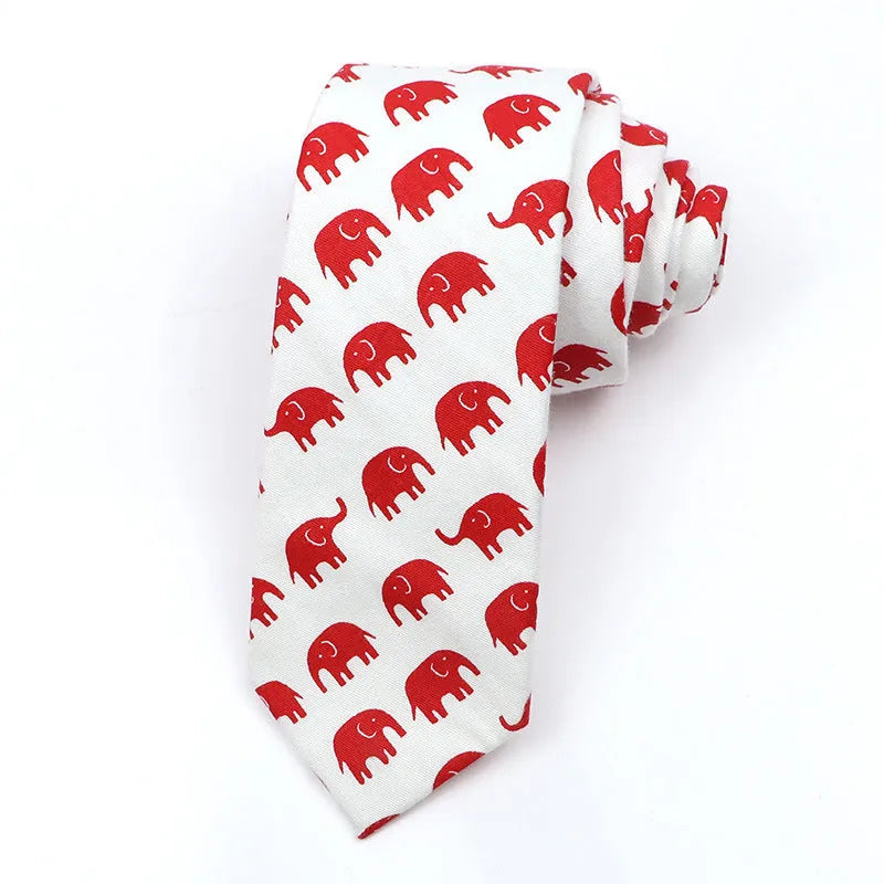 Narrow cotton bow tie with a printed cartoon pattern in a selection of colours.