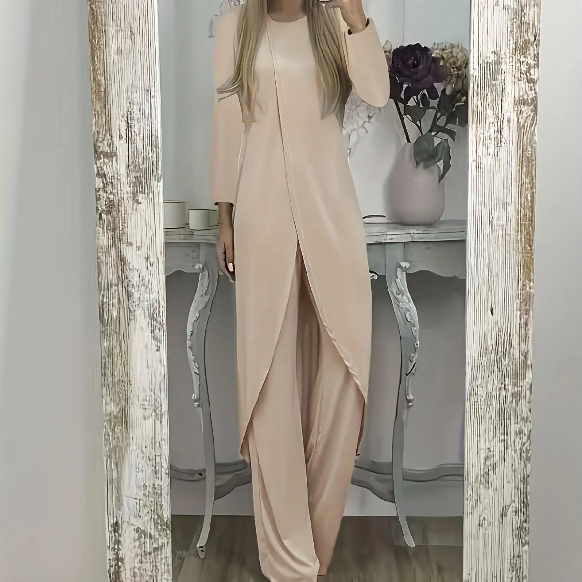Casual loose-fit two-piece set with a round neck long sleeve top and matching trousers in khaki colour.