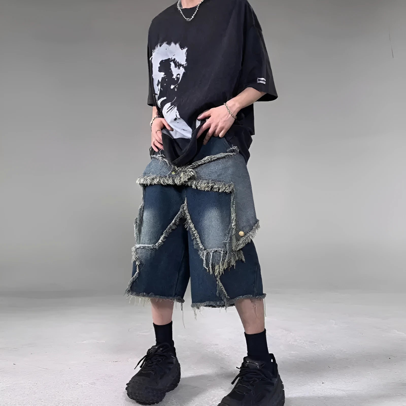 Blue denim shorts with frayed five-pointed star design and loose retro fit