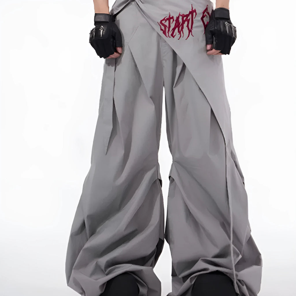 Boy modelling black wide-leg Korean-style summer pants on a casual backdrop.