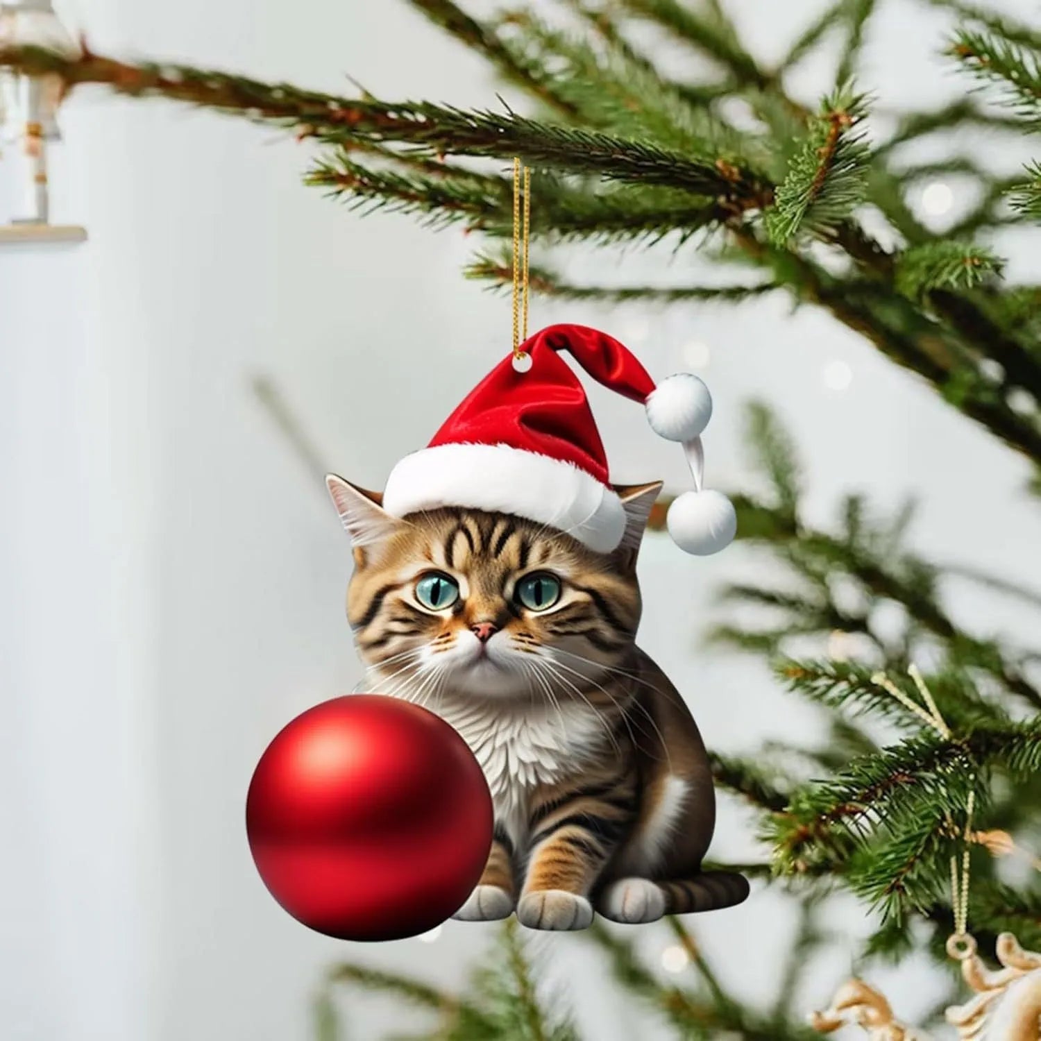 Colourful cartoon-style kitty cat Christmas ornament hanging, made from clear acrylic for car interiors.
