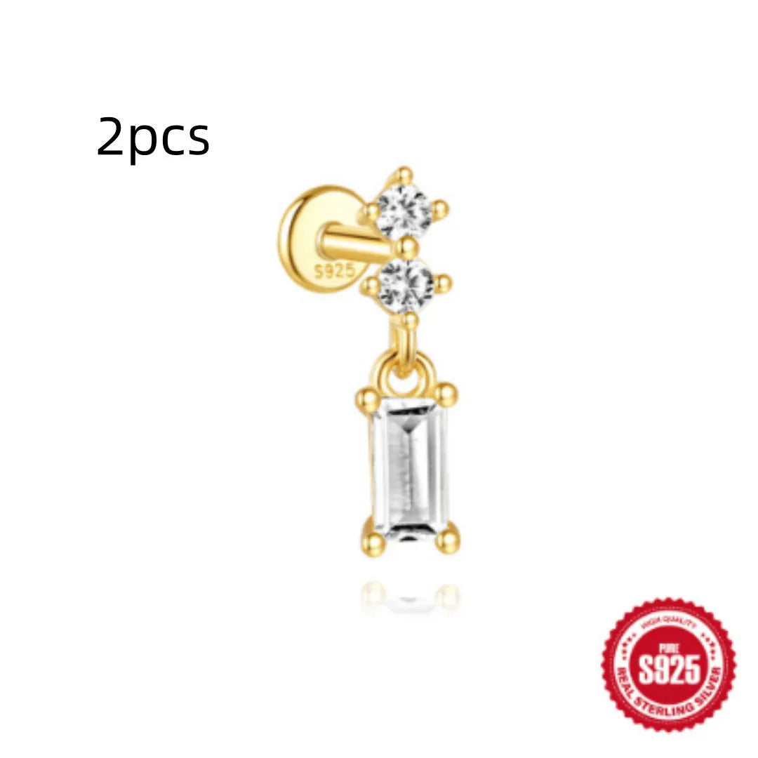 S925 sterling silver water drop shaped earring with a flat spiral puncture pattern, in a gold tone finish.