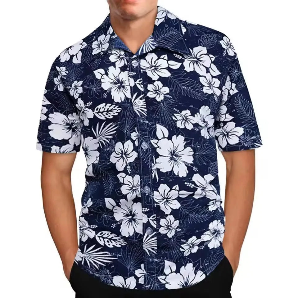 Man wearing a loose-fit short sleeve shirt with a colourful digital flower print pattern.