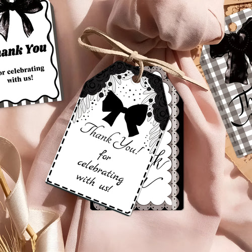 Set of 60 paper birthday gift tags with natural hemp rope in three bowknot designs.