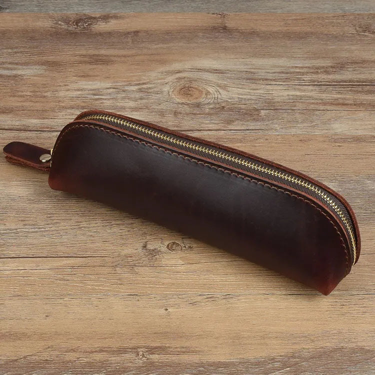 Square cowhide leather pencil case with zip closure measuring 18cm