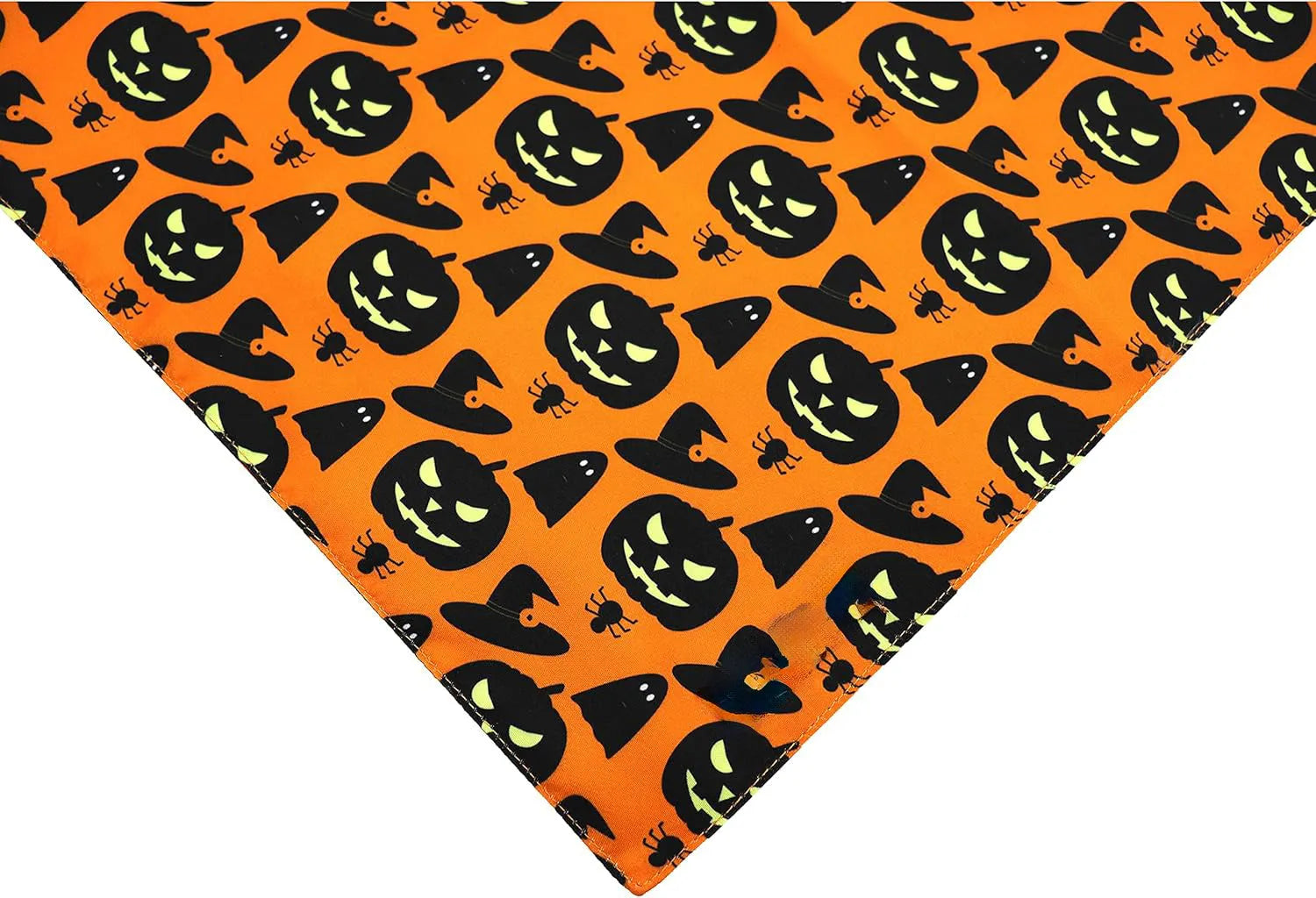 Reversible black and orange Halloween dog bandana with pumpkin and spider web patterns laid flat