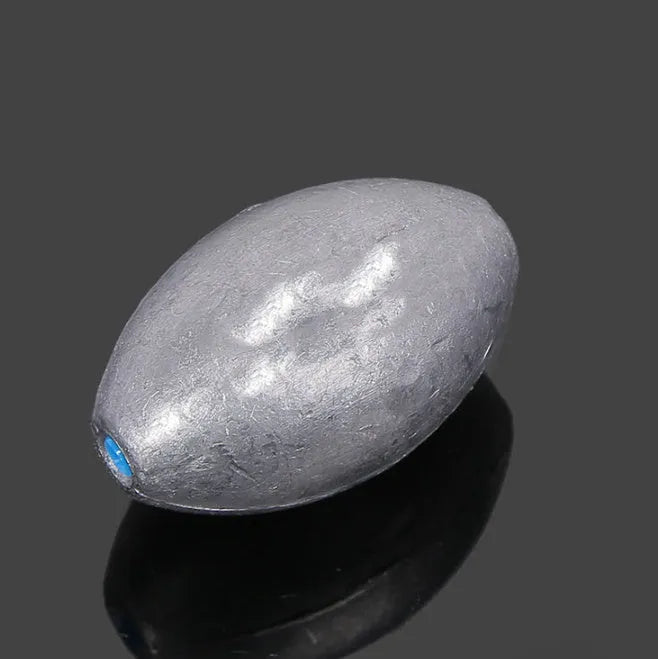Rugby-shaped olive fishing lead sinker with scale tongxin and plastic core, weights from 10g to 150g.