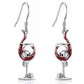 A pair of zinc alloy electroplated earrings with a combined skull and wine glass geometric design.