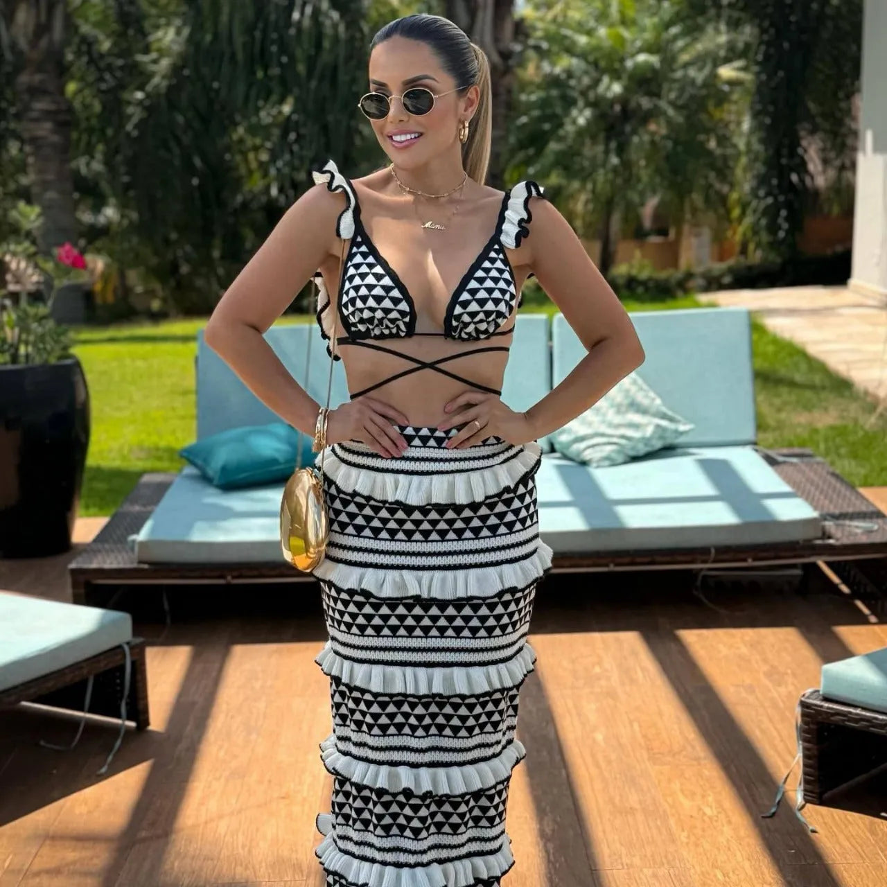 Black and white striped cotton bikini set with ruffled spaghetti strap top and long knitted skirt for women