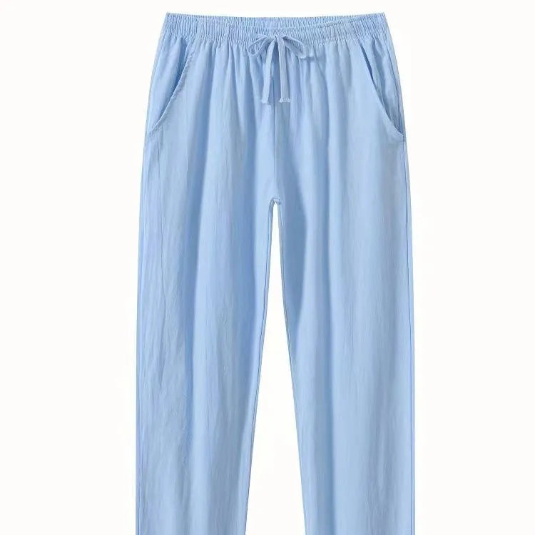 Men's cotton and linen beach pants in khaki, loose fit with drawstring waist, solid colour design