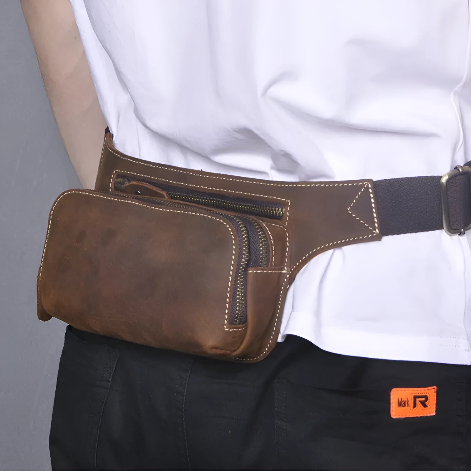 Brown cowhide men's sports waist bag with adjustable strap and internal phone pocket