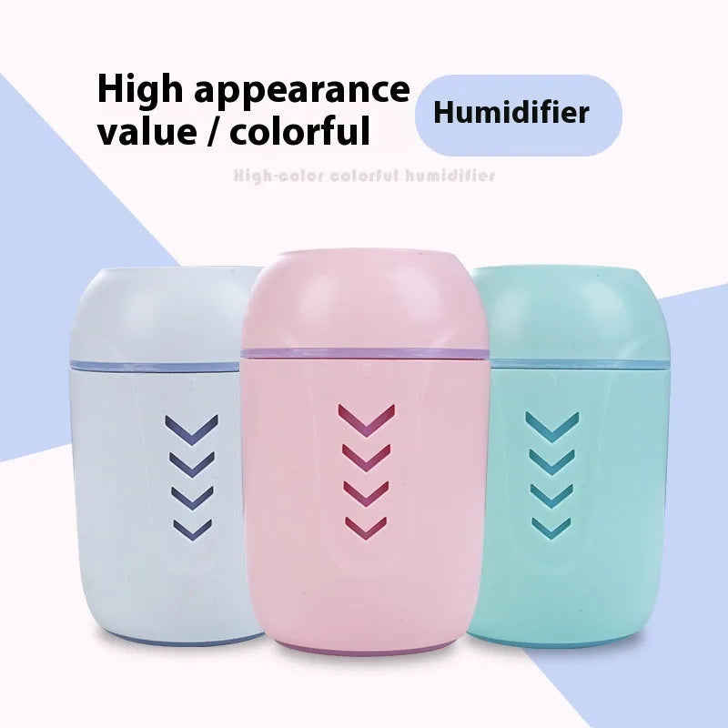 Compact round white portable air purifier with USB cable on a car dashboard and office desk.