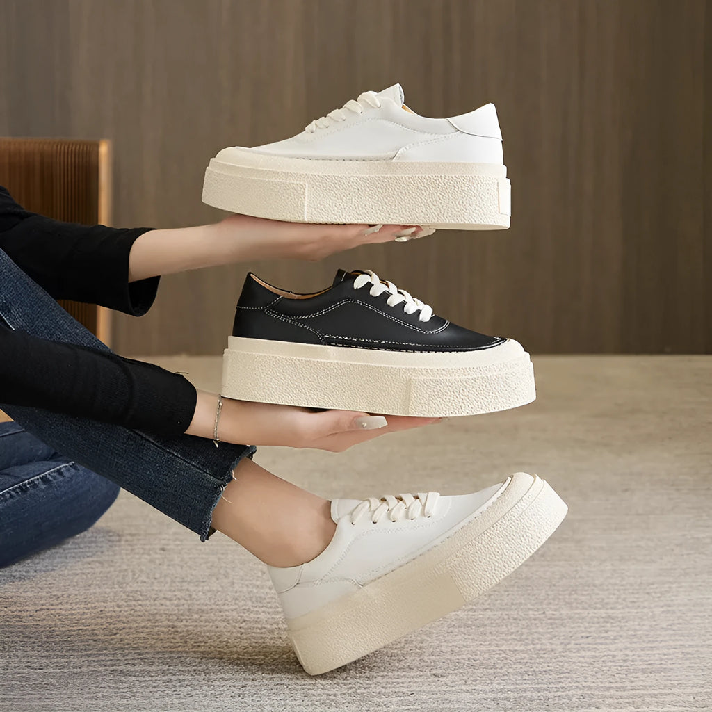 Women's black platform sports board shoes with embossed cowhide leather and rubber sole