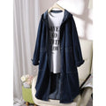 Solid colour hooded denim top in denim blue with large front pocket and long sleeves