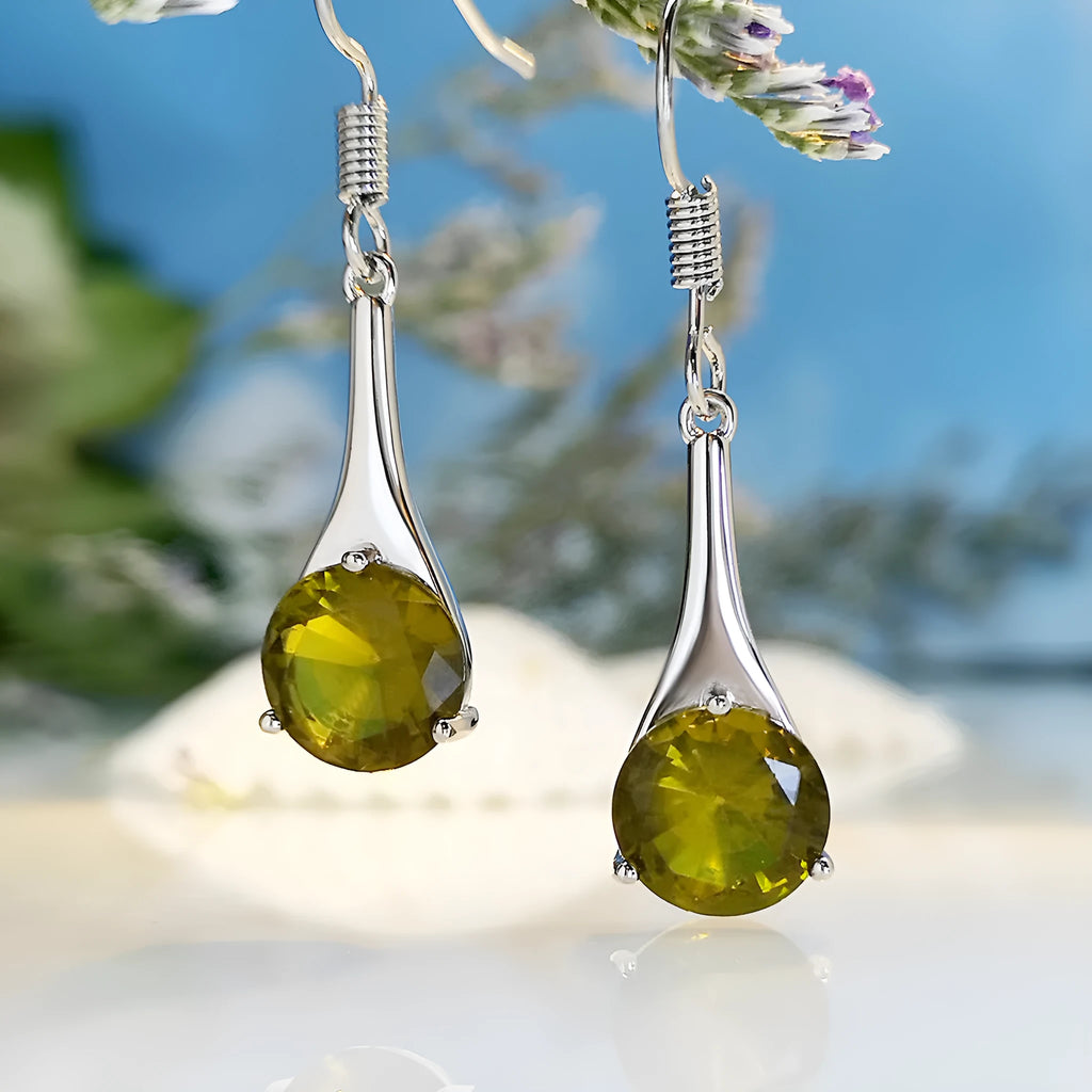 Olive green topaz earrings with water drop shape and retro style design