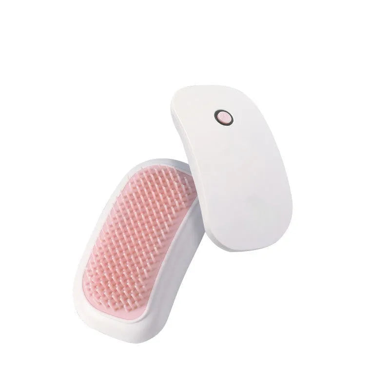 Light pink and white handheld electric pet massage brush with TPE teeth