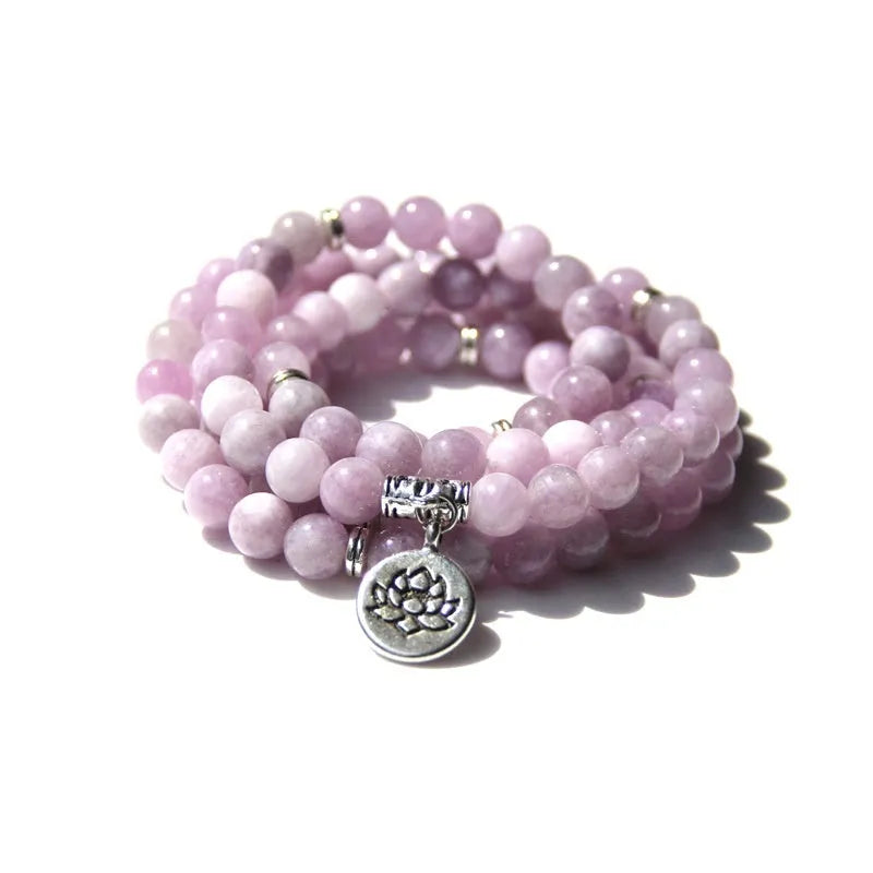 Women's bracelet with natural stone lotus pendant in geometric design showing eight colour variations