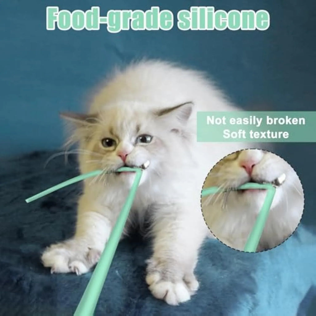 Green automatic cat toy with swinging silicone tails on a white surface