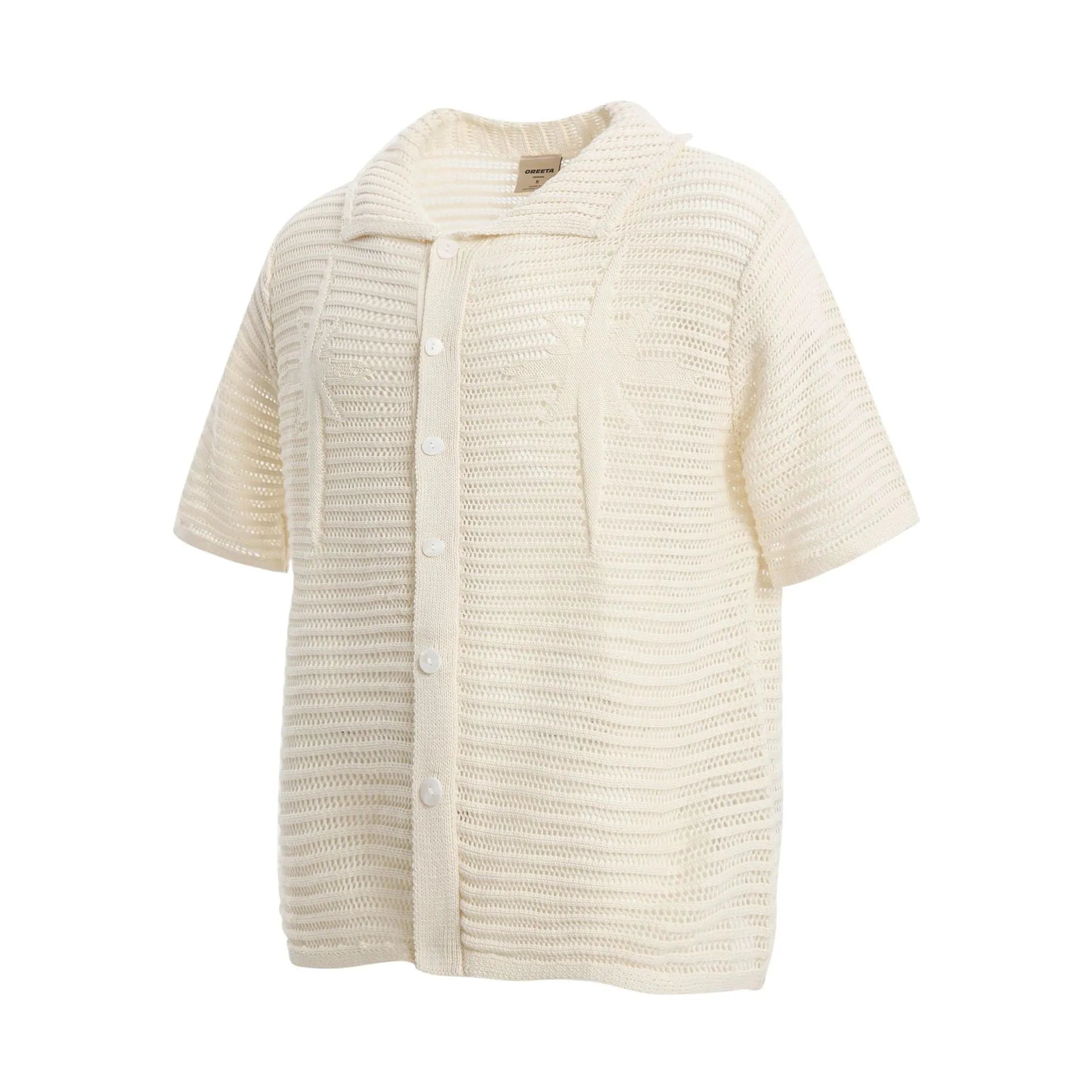 Loose fit retro style short sleeve cotton shirt in apricot colour on hanger