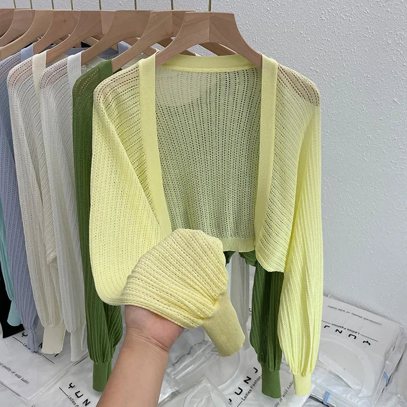 Women's linen blouse with hollow-out design and long lantern sleeves in apricot colour