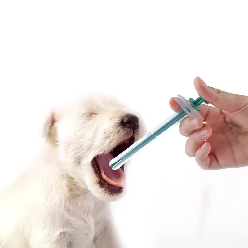 Two pet pill shooters with soft silicone tips for administering medication to cats and small dogs
