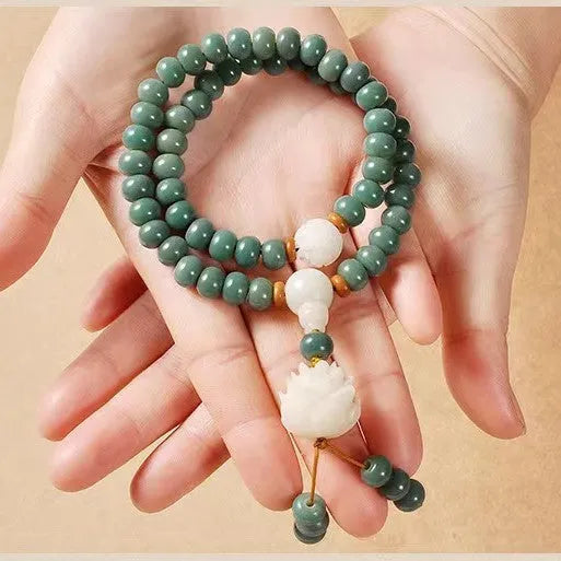 Natural bodhi seed bracelet with double ring safety buckle and lotus bead design