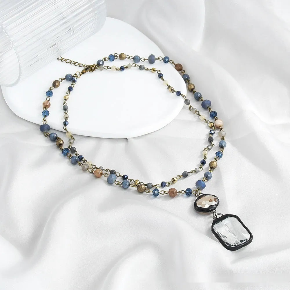 Two-layer tribal necklace with glass pendant and natural stones on adjustable 31-40cm chain