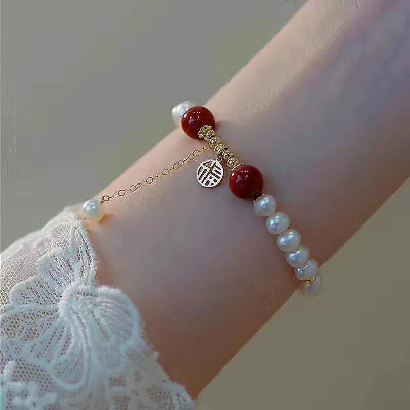 Chinese style glass bracelet with bamboo joint details in a red Lvzhu Duobao design.