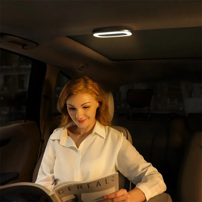 LED car reading light in black, USB rechargeable with 400mAh battery, two brightness gears, compact design