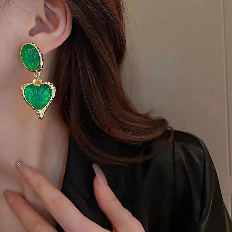 Alloy oval love heart stud earrings with pleated detail in four colour options