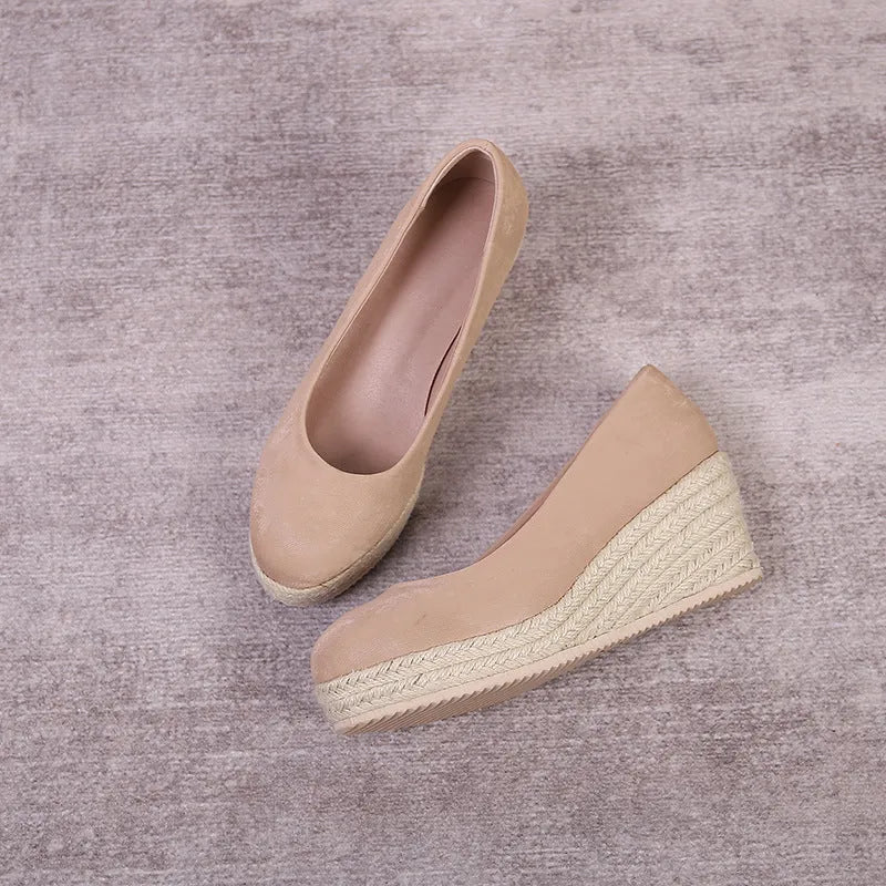 Apricot wedge high heel pumps with thick sole, rope heel detail, and shallow mouth.