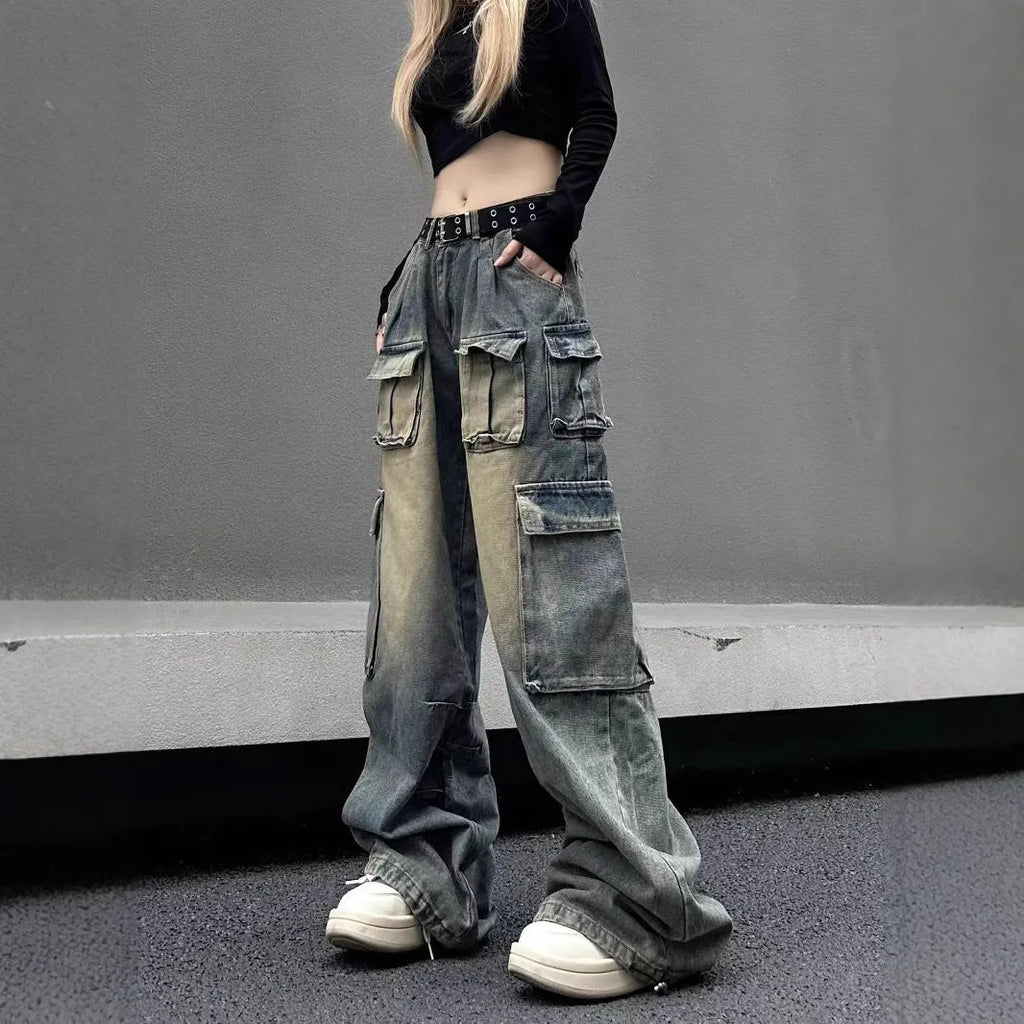 Loose-fit distressed denim jeans with multiple pockets in light blue wash, straight-leg street hipster style