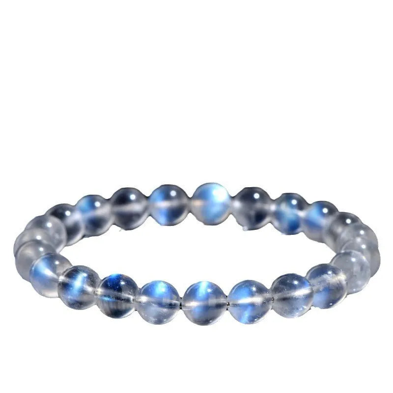 Natural cream body blue moonlight crystal bracelet with minimalist design showing ground finish stone