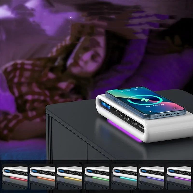 White desktop wireless charging pad with 15W fast charging and a multi-colour LED atmosphere lamp on top.