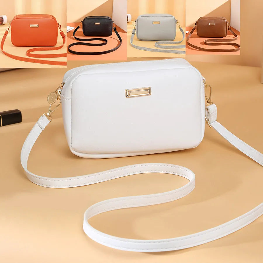 Solid colour women's PU shoulder bag with three-dimensional pocket design in urban simple style