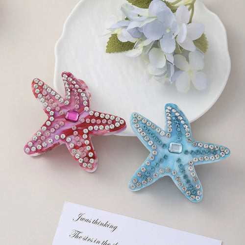 Acrylic starfish hairpin with diamond encrusted surface in blue colour, 8cm length