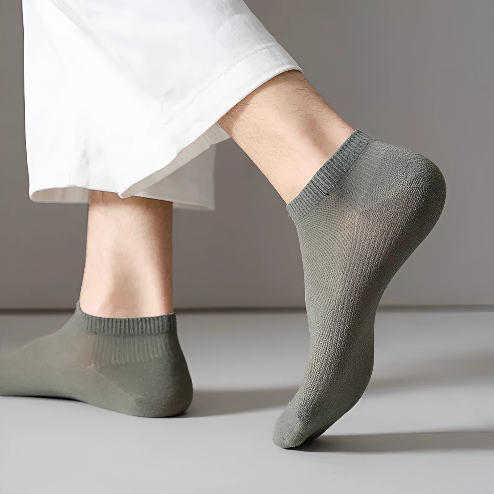 Men's low-cut solid colour boat socks made from breathable polyester, shown in one of six available colour options.