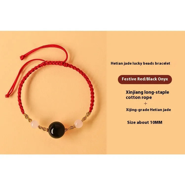 Hand-woven red rope bracelet with Hetian jade lucky beads and Chinese motif carvings