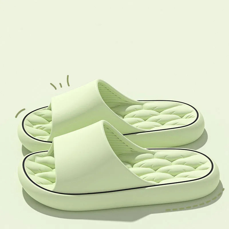 Non-slip EVA bathroom slippers with thick sole and hollow upper in grey, side view